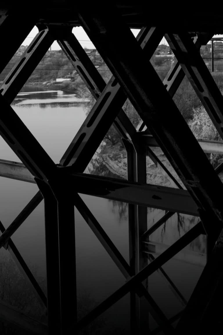 metal beams under a bridge